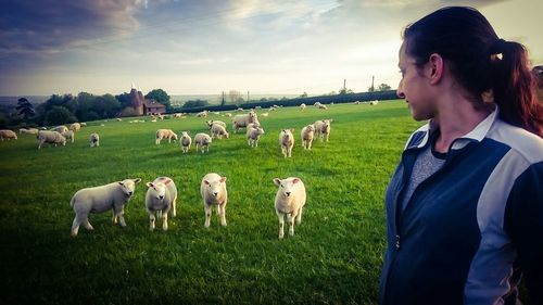 Young woman standing in a field