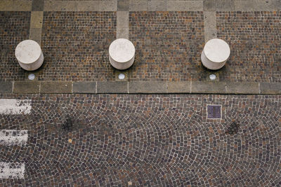 High angle view of paving stone on street