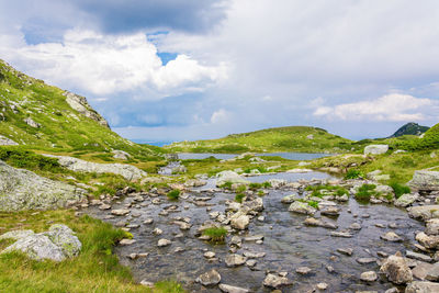 Scenic view of rocks against sky