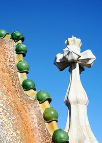 Low angle view of built structure against clear blue sky