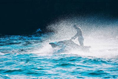 Man swimming in sea