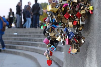 Close-up of padlocks hanging on railing