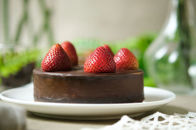 Close-up of strawberries in bowl on table