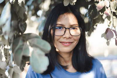 Portrait of smiling young woman