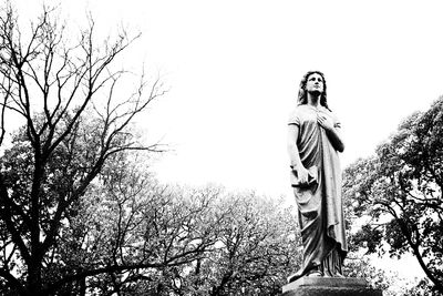 Low angle view of statue against clear sky