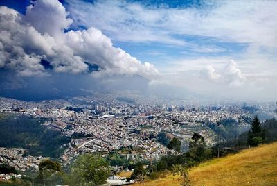 Aerial view of cityscape against sky