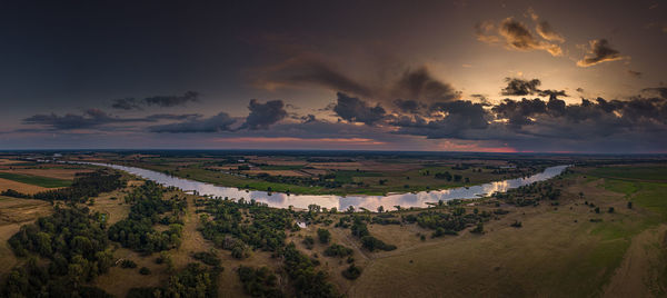 Panoramic view of landscape against sky during sunset