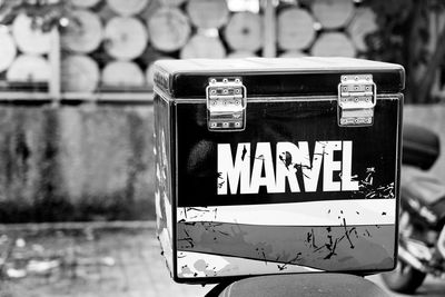 Close-up of text on glass