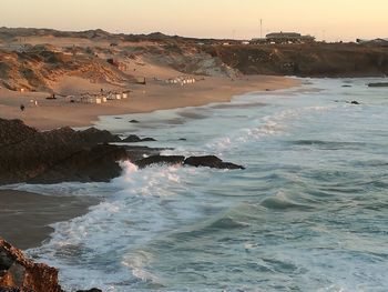 View of calm beach against the sky