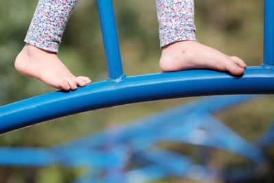Low section of girl  on playground