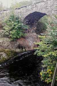 High angle view of water flowing through rocks