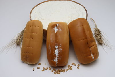 High angle view of food on table against white background