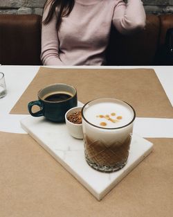 Close-up of coffee cup on table