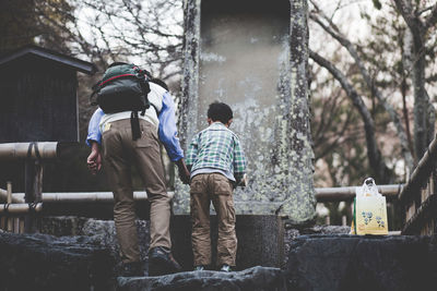 Rear view of people in winter