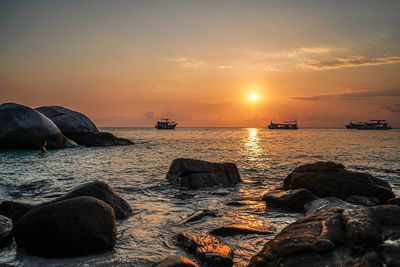 Scenic view of sea against sky during sunset