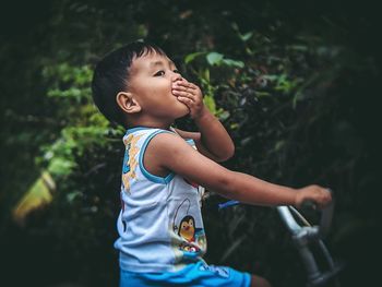 Cute boy looking away