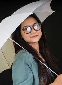 Portrait of smiling young woman