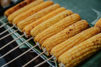 Close-up of meat on barbecue grill