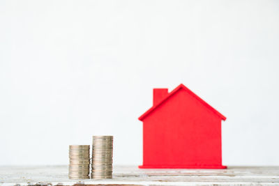 Stack of house against white background