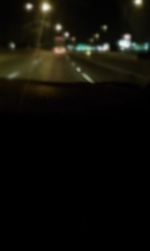 Cars on road at night