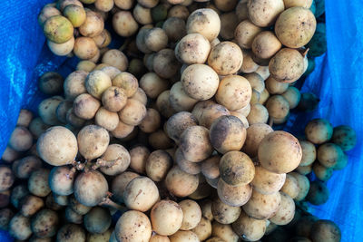 Full frame shot of onions for sale in market