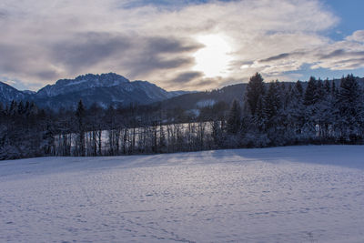 Scenic view of mountains against sky during winter