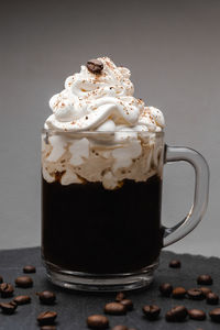 Close-up of coffee cup against white background