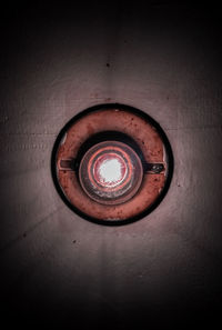 Close-up of electric lamp on wall
