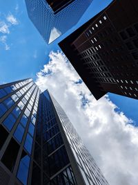 Low angle view of modern buildings against sky