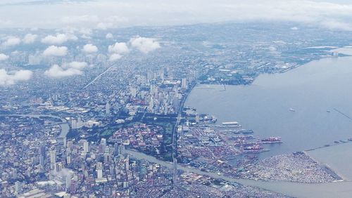High angle view of buildings against sky in city
