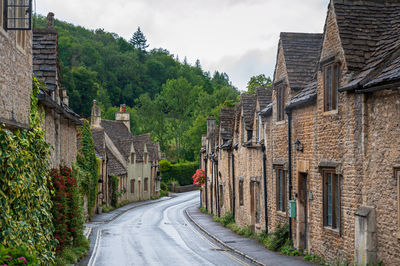 Castle combe, quaint village with well preserved stone houses dated back to 16 century in cotswolds.