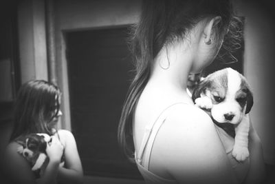 Close-up of girl with dog