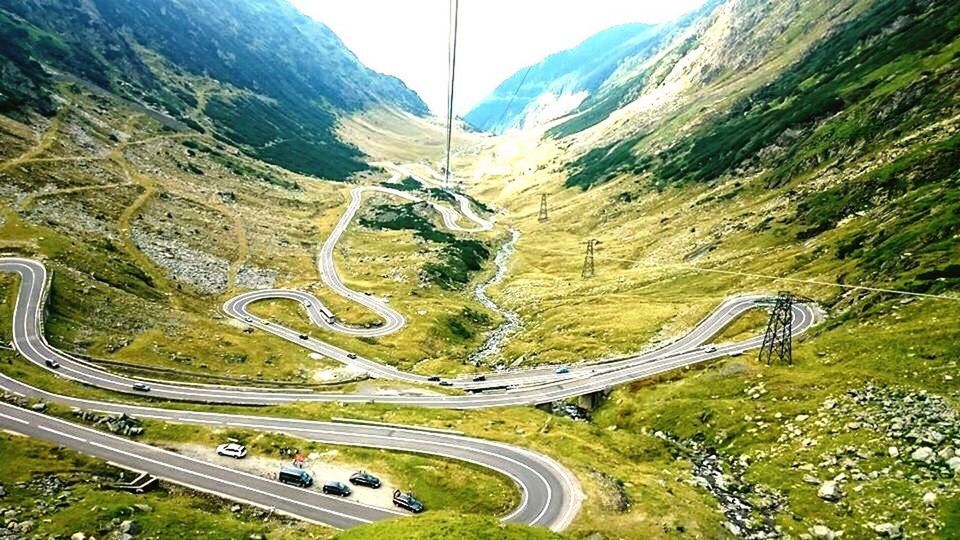 HIGH ANGLE VIEW OF MOUNTAIN ROAD