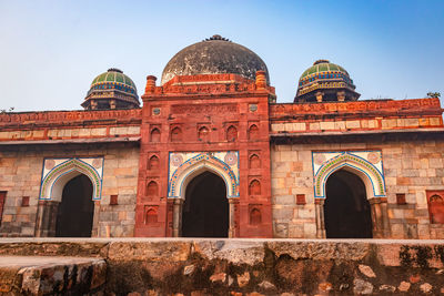 Mosque and tomb of isa khan of humayun tomb exterior view at misty morning from unique perspective