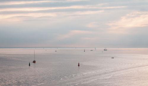 Scenic view of sea against sky during winter