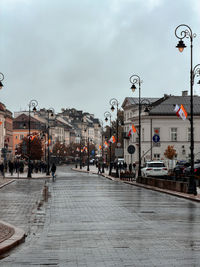 Buildings in city against sky