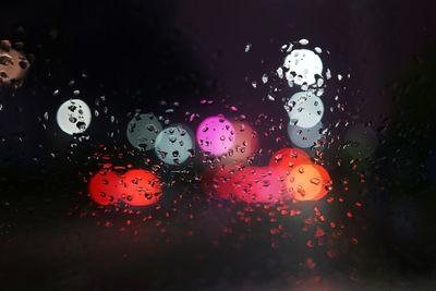 Close-up of raindrops on window