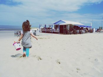 Woman standing on beach