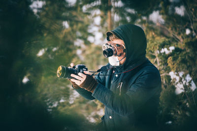 Man photographing with camera