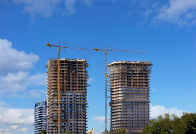 Low angle view of modern building against sky