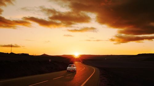 Road against sky during sunset