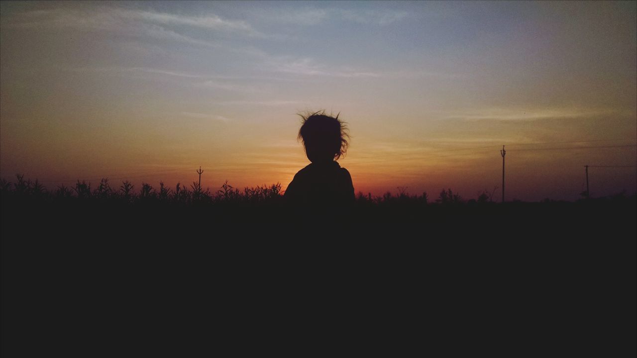 silhouette, sunset, sky, tranquil scene, tranquility, landscape, scenics, beauty in nature, standing, nature, field, copy space, idyllic, outline, leisure activity, solitude, lifestyles, rear view