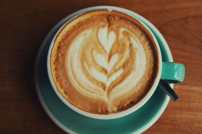 High angle view of cappuccino on table