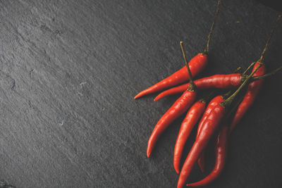 High angle view of chili peppers on table