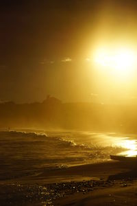 Scenic view of sea at sunset