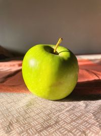 Close-up of apple on table