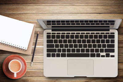 High angle view of coffee cup on table