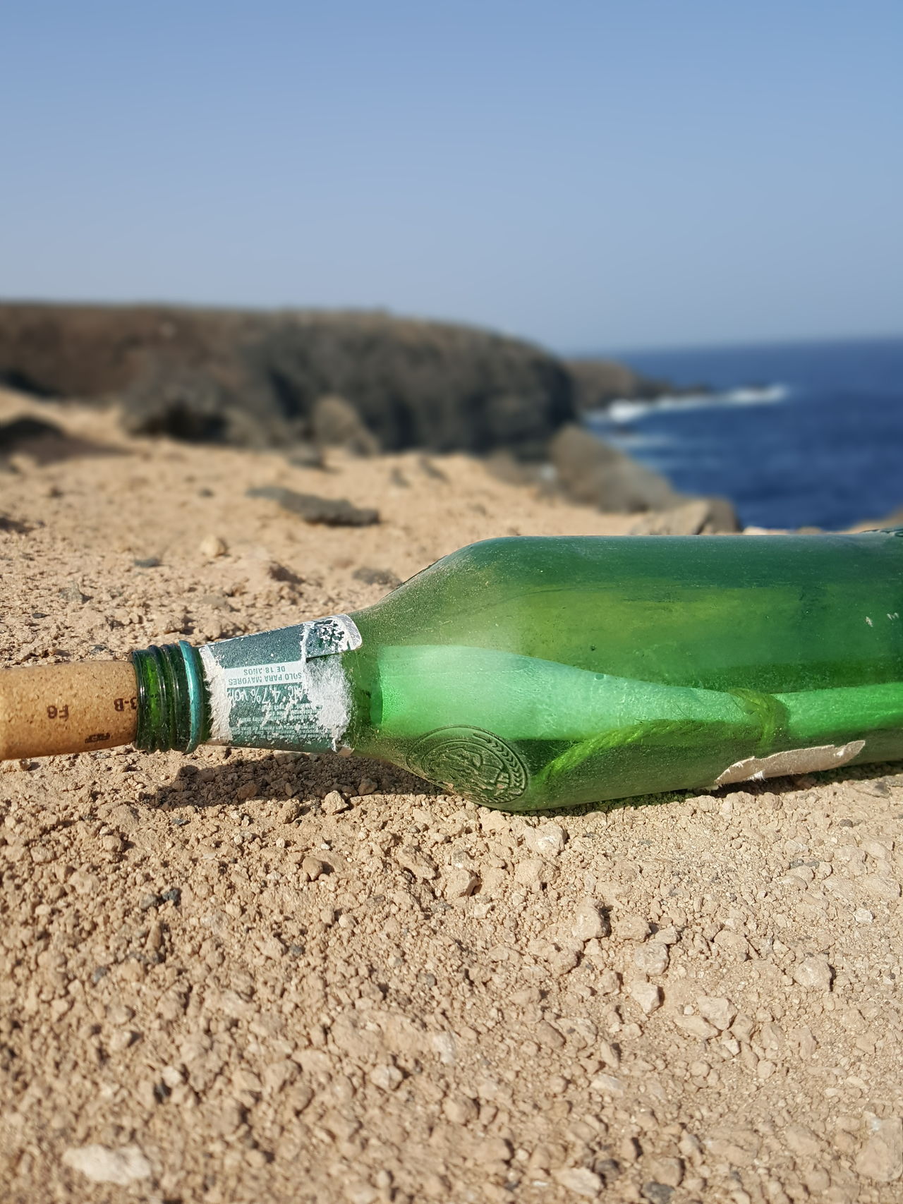 Bottle post and beach