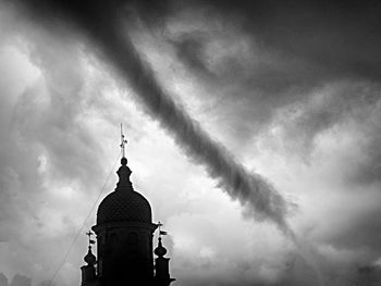 Low angle view of church and building against sky