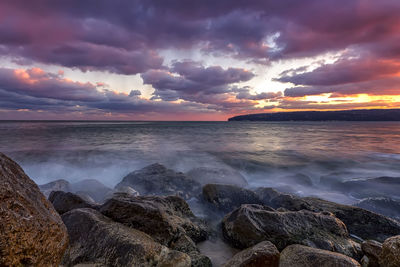 Scenic view of sea against sky during sunset